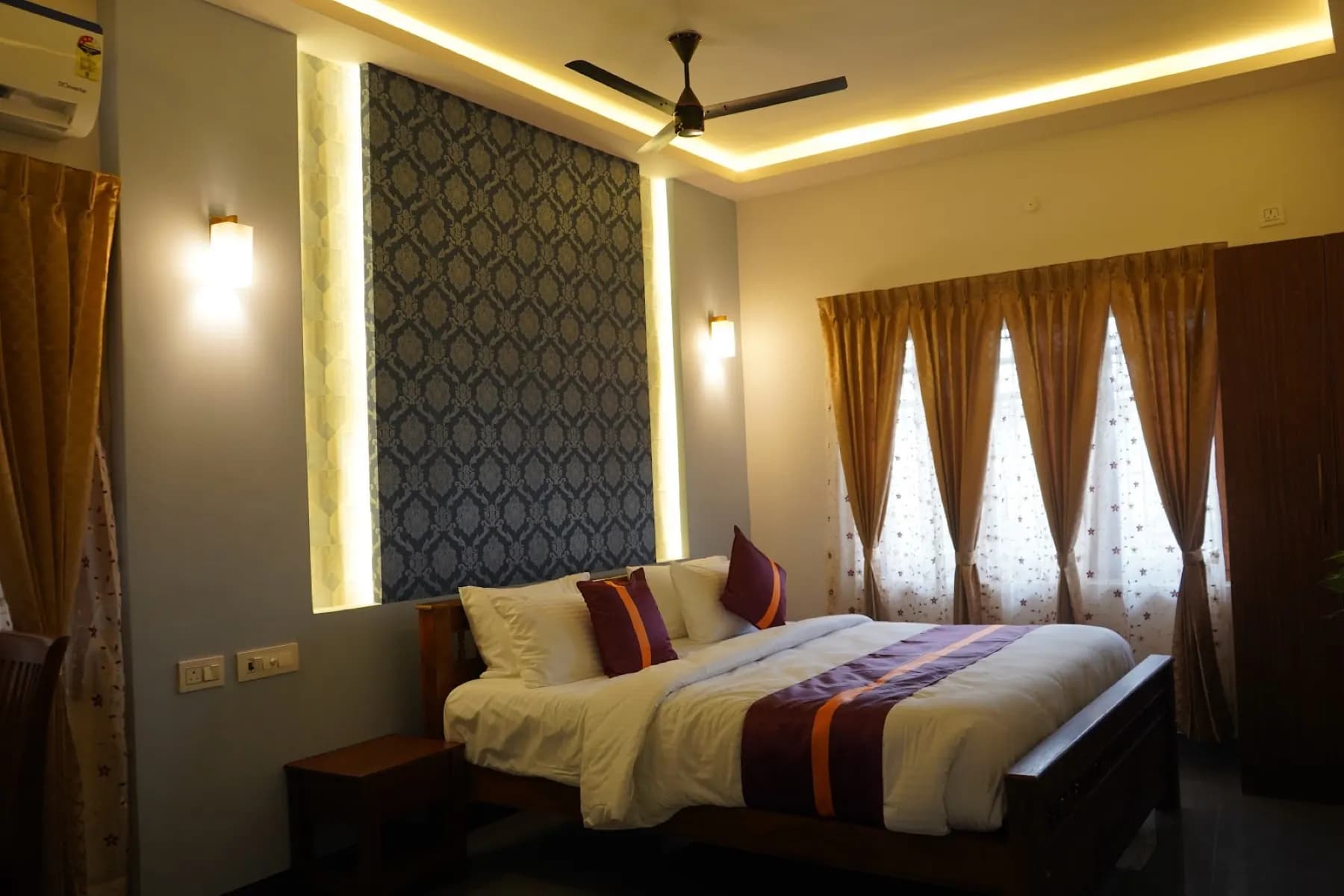 Villa bedroom with warm lighting at MSS Resort